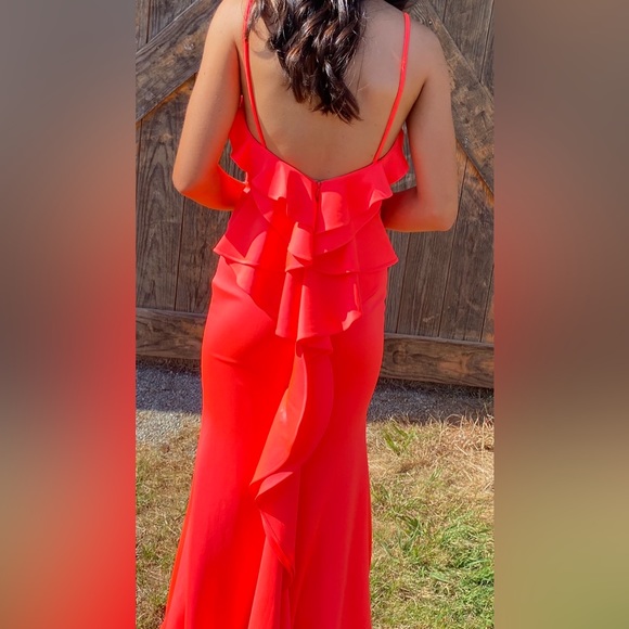Beautiful prom dress.  Bright coral color.  Worn once and has been cleaned. - Picture 2 of 3